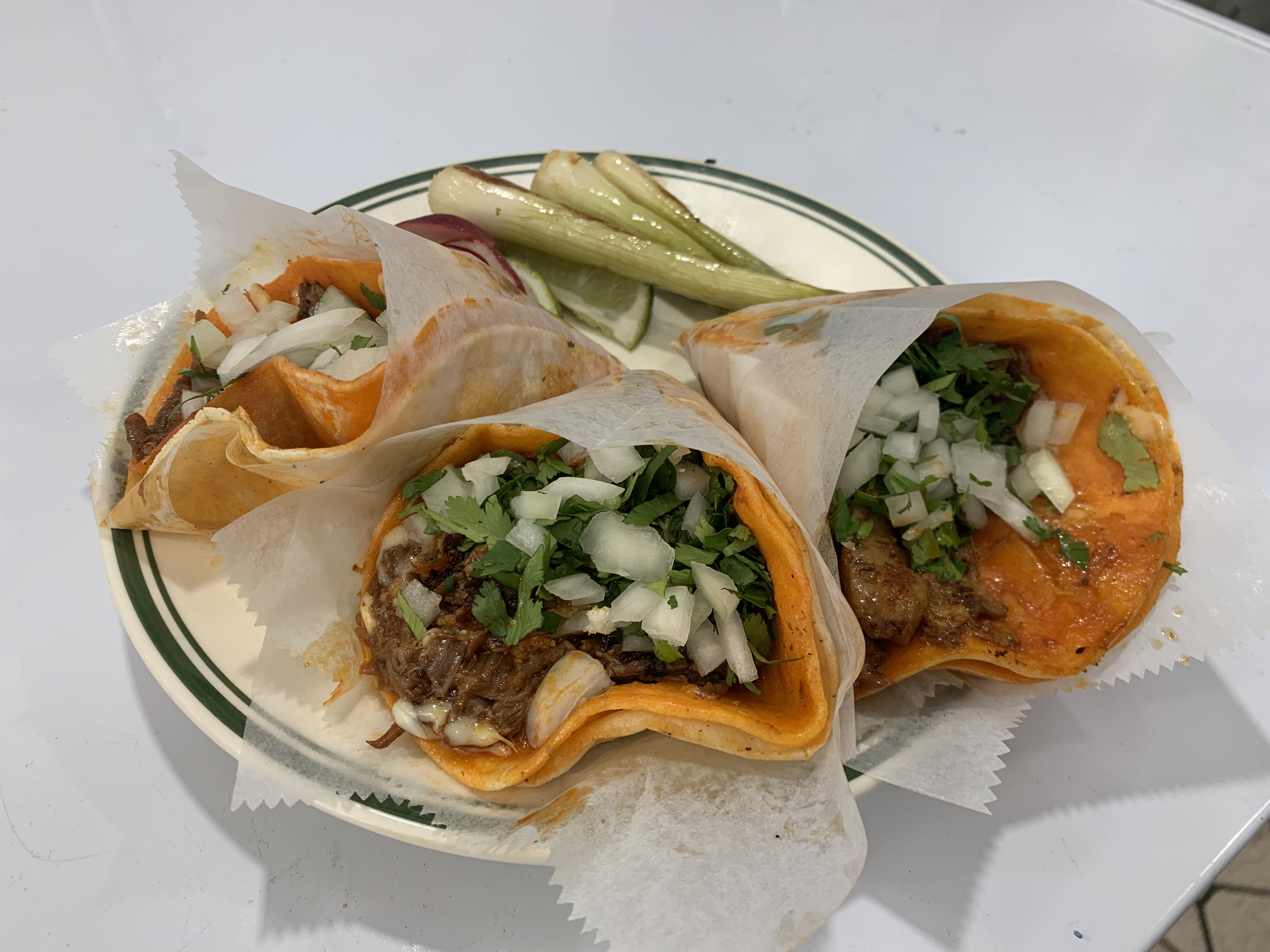 Birria tacos with consommé